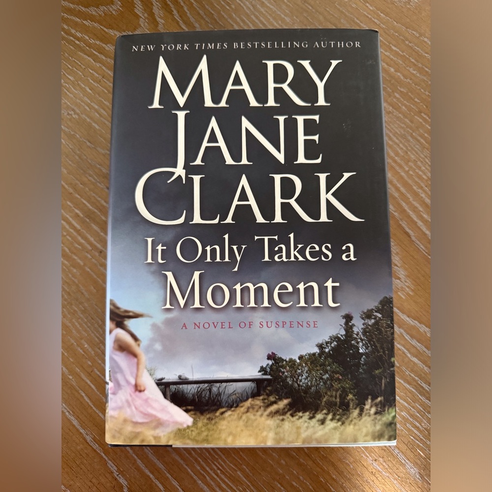 IT ONLY TAKES A MOMENT BY MARY JANE CLARK- HARDCOVER BOOK